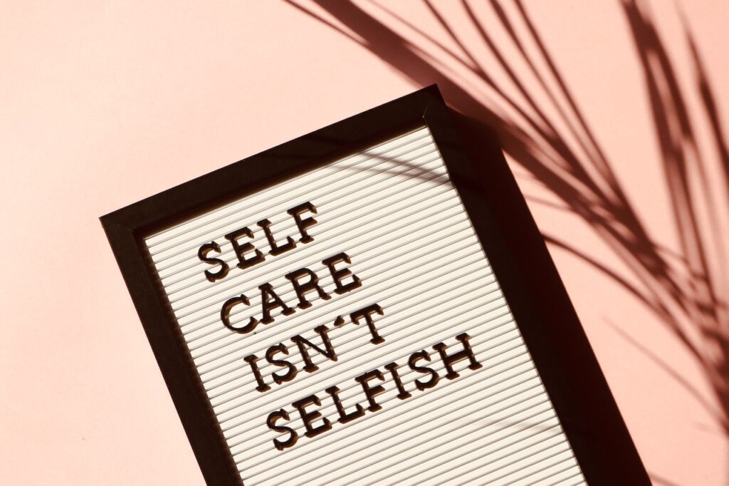 self care isn't selfish inside a photo frame